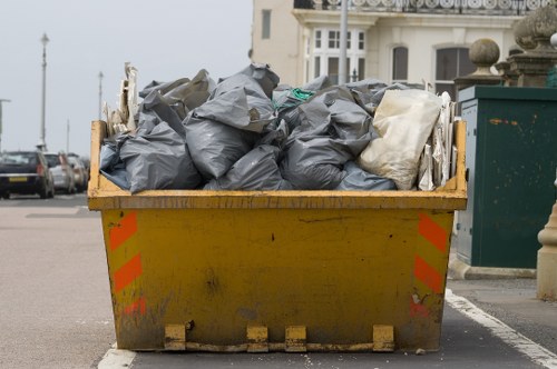 Construction site with building materials being cleared